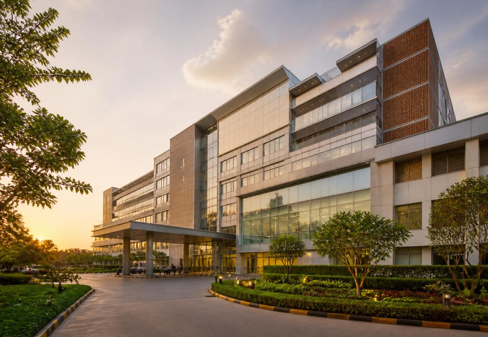 Entrance of a modern multi-speciality hospital in India at golden hour